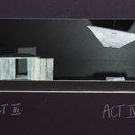 A model box for four acts of a play featuring a series of geometric concrete slabs