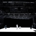 Kobna Holdbrook-Smith, Taylor Russell, Paapa Essiedu and Michele Austin performing in The Effect. They are on a white stage with no set or props besides two plain chairs.
