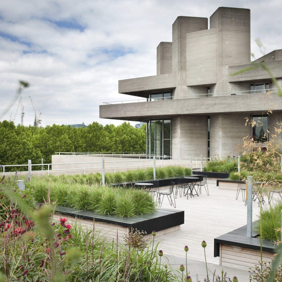 An exterior terrace of the National Theatre, with planting in various raised beds.