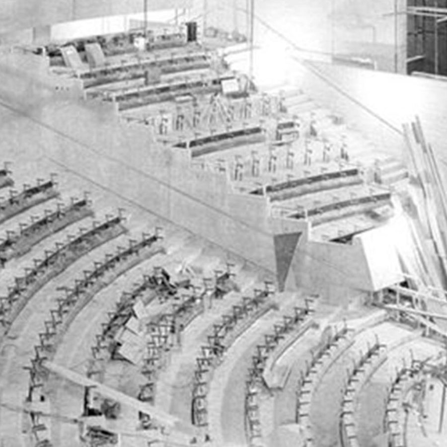A monochrome photograph of the Olivier Theatre under construction in the early 1970s
