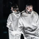 Paapa Essiedu as Tristan and Taylor Russell as Connie in The Effect. They are facing away from one another and are wearing white tracksuits.